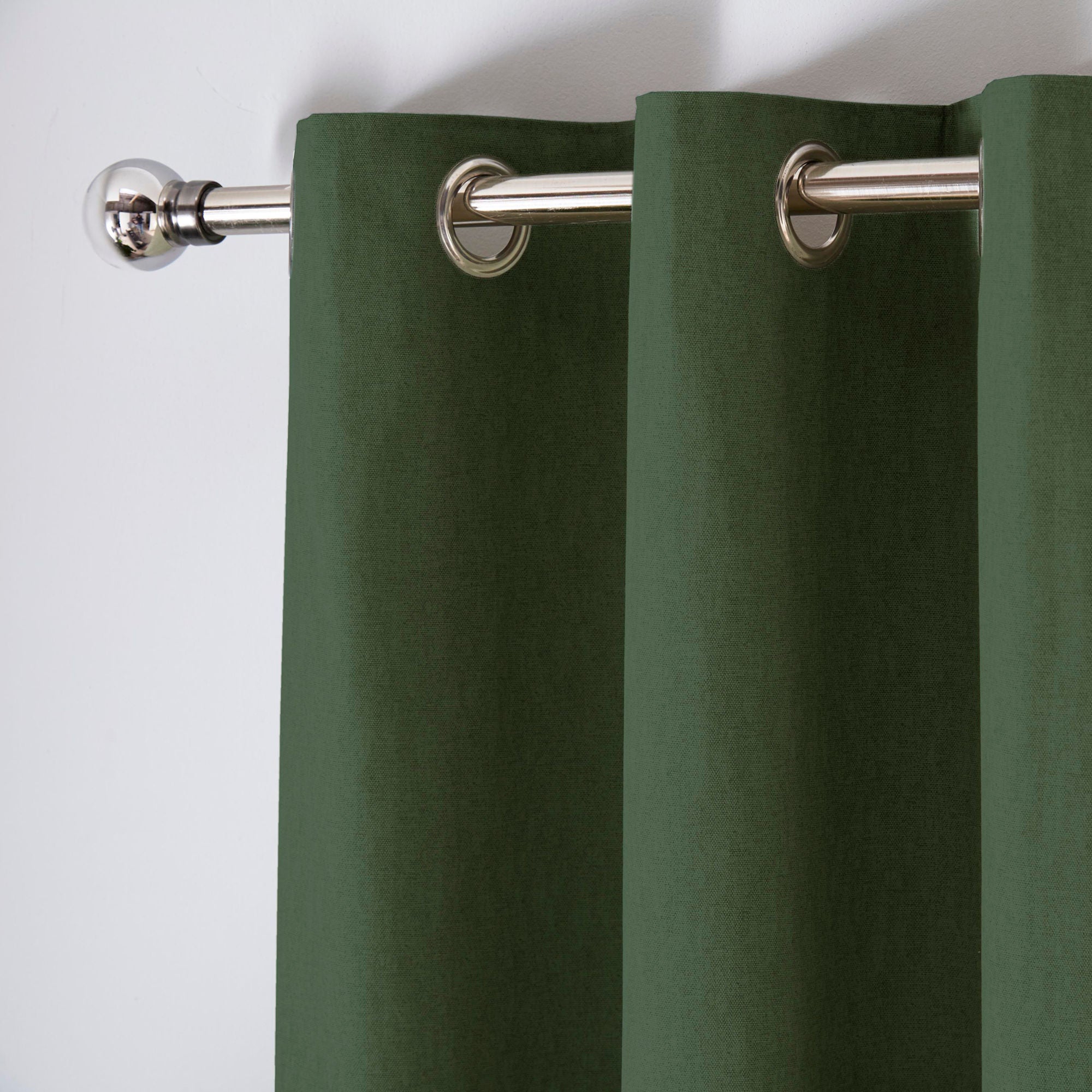 Cannes Pair of Eyelet Curtains by Fusion in Bottle Green - Pair of Eyelet Curtains - Fusion