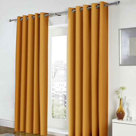 Freya Eyelet Curtains in Ochre
